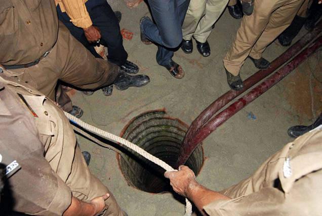 Intense efforts were underway today to pull out a six-year-old boy trapped in an abandoned borewell at a farm in nearby Sulikeri village. File photo - PTI