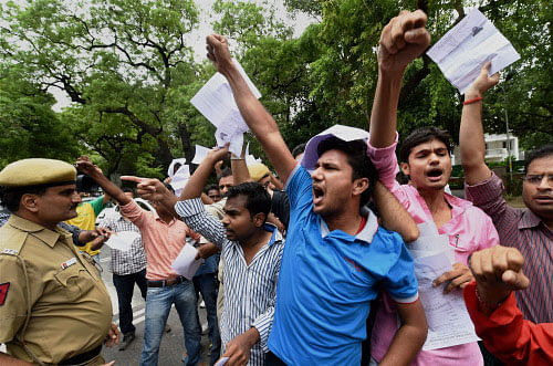 Not satisfied with the changes announced by the government in the UPSC exam, scores of civil services aspirants today vowed to continue their fight for complete scrapping of the CSAT paper and decided to shift their agitation to Jantar Mantar in central Delhi. PTI photo