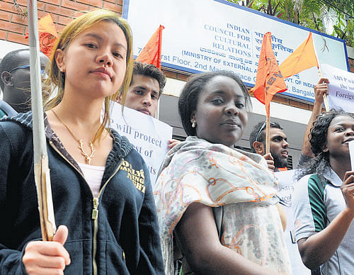 UP in arms Foreign students and ABVP activists protest in front of the ICCR Regional office in City on Monday. DH PHOTO