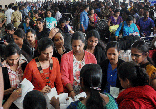 The batch of 44 Kerala nurses, evacuated from Libya, on their arrival at the airport in Kochi on Tuesday. PTI Photo
