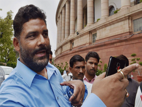 RJD member Pappu Yadav emerged as the unlikely architect of the protests in the Lok Sabha by the Congress and its allies to press for their demand for a discussion on increasing incidents of communal violence across the country. PTI photo