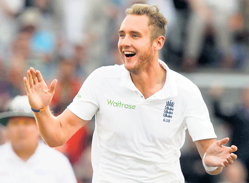 England's Stuart Broad celebrates the dismissal of Cheteshwar Pujara on the opening day of the fourth Test. AP