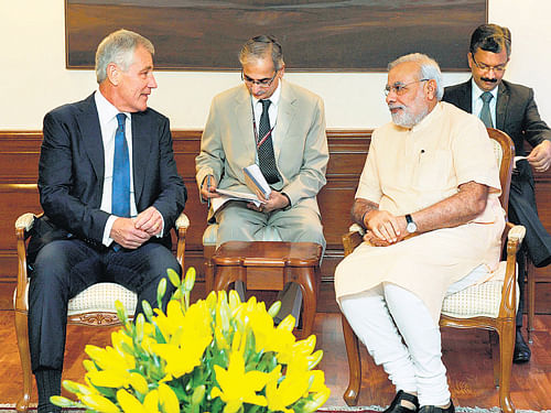 Prime Minister Narendra Modi with US Defence Secretary Chuck Hagel during a meeting in New Delhi on Friday. PTI