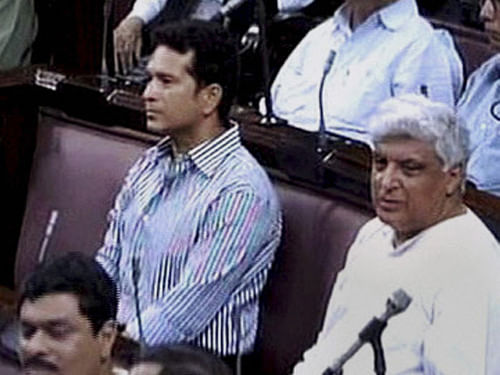 Sachin Tendulkar with other Members in the Rajya Sabha in New Delhi on the first day of monsoon session. Cricket legend  Sachin Tendulkar and yesteryear Bollywood star Rekha were criticised for their prolonged absence from the Rajya Sabha after they became members two years ago. PTI file photo