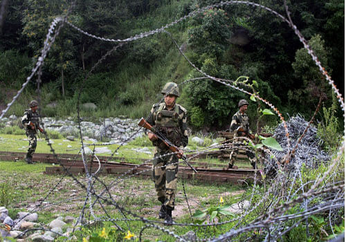 Two troopers and two women were injured Monday as Pakistan Rangers opened fire at Indian positions on the international border in Jammu district, an official said. Reuters file photo for representation