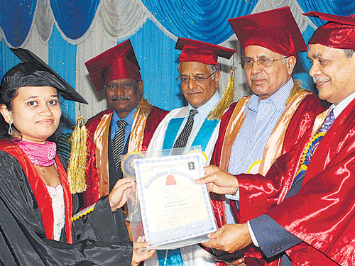 One of the students receiving the certificate.