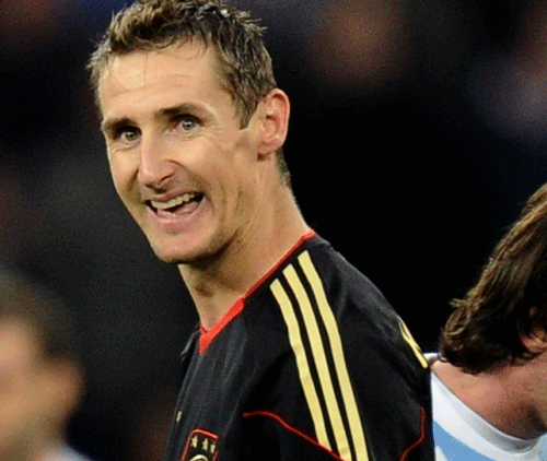 Having achieved his dream of winning the World Cup, German Miroslav Klose announced his  retirement from international football on Monday. AP file photo