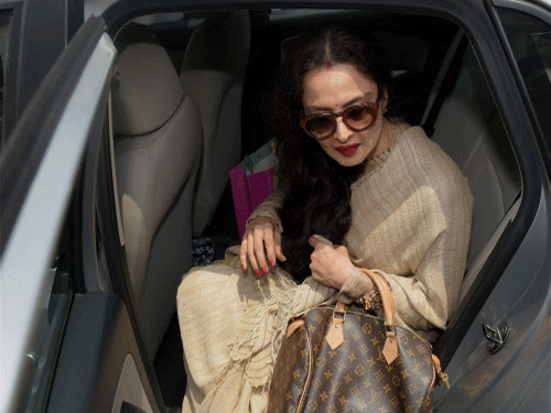 Under fire over her absence from the upper house, actor Rekha attended the Rajya Sabha for the first time during this session Tuesday. PTI photo