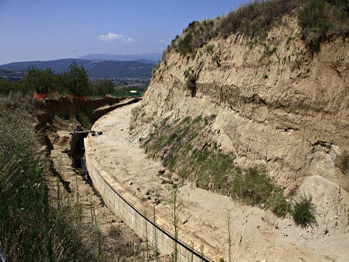 A partial view of the site where archaeologists are excavating an ancient mound in Amphipolis, northern Greece. Archaeologists have unearthed a funeral mound dating from the time of Alexander the Great and believed to be the largest ever discovered in Greece, but are stumped about who was buried in it. AP photo