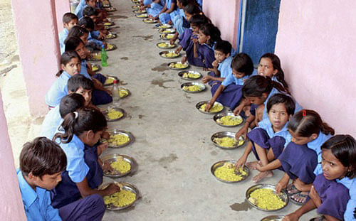 The Human Resource Development Ministry has asked states to prepare menu for each midday meal according to the taste and liking of children and avoid providing the same meal everyday. PTI photo