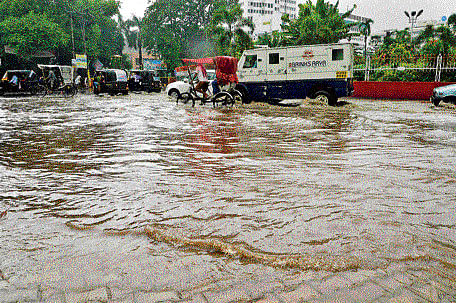 The roads of Patna were waterlogged on Wednesday following heavy rain, betraying civic authorities' claims of proper drainage systems. PHOTO by Mohan Prasad