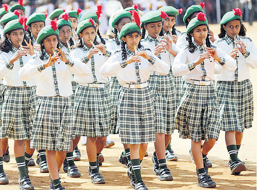Schoolgirls participate in 68th Independence Day celebrations at theManekshaw Parade Grounds in Bangalore on Friday. DH PHOTO