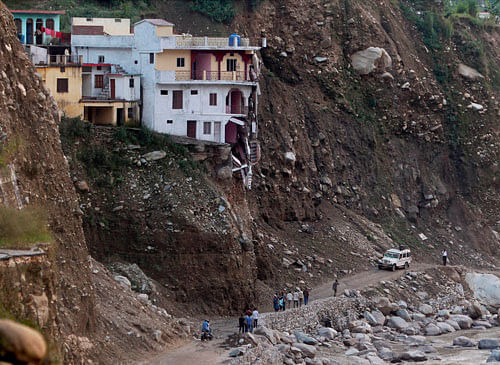 Seven persons including a woman were killed here when three houses were buried in a landslide following heavy showers in the wee hours of the day, taking the toll to 24 in rain-related incidents in two days in Uttarakhand. PTI file photo. For representation purpose