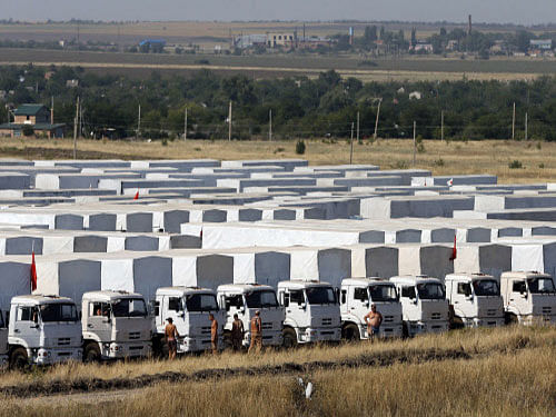 A Russian convoy of trucks carrying humanitarian aid for Ukraine is parked at a camp near Kamensk-Shakhtinsky, Rostov Region. Ukraine's crisis entered dangerous new territory today with Kiev claiming its forces destroyed a Russian military convoy, while the US warned Moscow over its 'provocative' efforts at destabilisation. Reuters photo