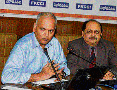 Additional Chief Secretary to the Department of Tourism, government of Karnataka, Arvind Jadhav (on the left), speaking at an interaction organised by FKCCI in Bangaloreon Saturday