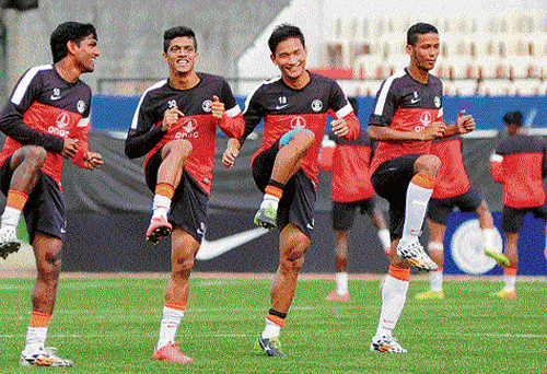 geared up: (From left) Indian team players Francisco Fernandes, Mandar Rao Dessai, Seiminlen Doungel and Narayan Das during a training session at the Bangalore Football Stadium on Tuesday. dh photo/ kishor kumar bolar