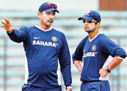 By naming Ravi Shastri (right) as Team Director, the BCCI has fallen back on the time when then  skipper Rahul Dravid and the former all-rounder forged a successful combination in the post-Greg Chappell period. DH file photo
