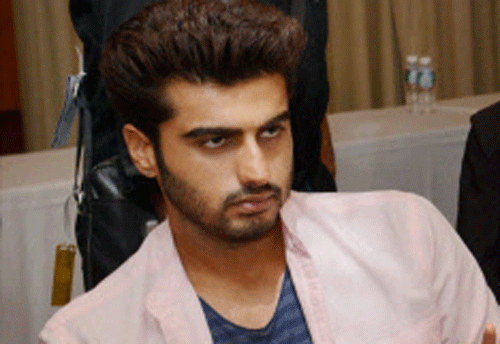 Ok for the record me n my back r just fine...one of the most random articles I have read recently about myself.. Btw Tevar's last day today, Arjun posted on his Twitter page Thursday. /  AP file photo
