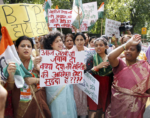 Congress Mahila Morcha members protesting against Defence Minister Arun Jaitley over his remark calling the Delhi gang-rape 'one small incident' in New Delhi on Friday. PTI Photo