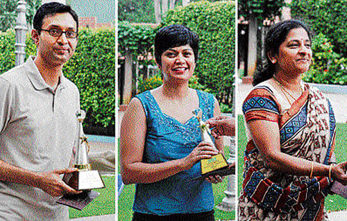 Deccan Herald's Sunday Herald short story competition winners Rohith Rajagopal (first prize), T S Ronnie (second prize) and Srividya Gopalan, the mother of third prize winner  Akshara Gopalan, receive the awards at a function on Friday. Dh photo