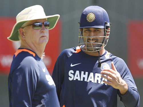 Ending speculation about coach Duncan Fletcher's role in the five one-dayers against England, Indian skipper Mahendra Singh Dhoni today said that the Zimbabwean will stay as 'boss' of the team until the 2015 World Cup. AP photo
