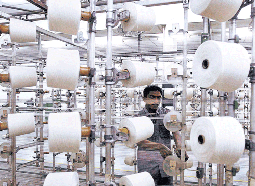 Anemployeeworks inside a textile mill on the outskirts of Ahmedabad. Internal regulations and underdevelopment in India, combined with British colonial depredations, has prevented resources frombeing redeployedproductively. REUTERS Photo