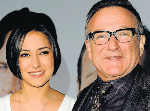 A file photo of Robin Williams, right, with his daughter, Zelda Williams, who was hounded by trolls recently. AP Photo