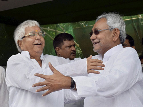 Rebonding of old rivals Lalu Prasad and Nitish Kumar today checkmated BJP's march in Bihar with secular alliance winning 6 of the 10 Assembly seats where bye-elections were held on August 21. PTI photo