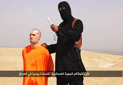 The gruesome video of an Islamist militant beheading an American journalist was probably staged with the actual murder taking place off-camera, according to forensic experts. Reuters photo