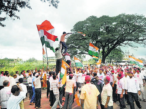 party time: Congress workers celebrate party candidate Ganesh Hukkeri's victory in  the Chikodi-Sadalga bypoll in Chikodi on Monday. DH photo