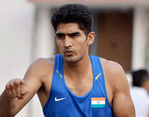A hand injury sustained during the Commonwealth Games has forced star Indian boxer Vijender Singh out of action for an indefinite period, which includes the upcoming Asian Games where he was the defending champion. PTI photo