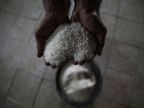 Water-starved South Asian nations have devised their own answer to the Ice Bucket Challenge taking the social media world by storm, instead filling buckets with rice and other supplies for the needy. PTI file photo. For representation purpose