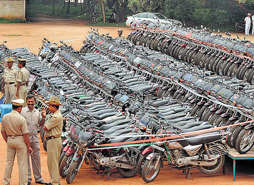large haul: As many as 200 two-wheelers recovered by the west division police are kept at the property parade in Bangalore on Wednesday. DH&#8200;PHOTO
