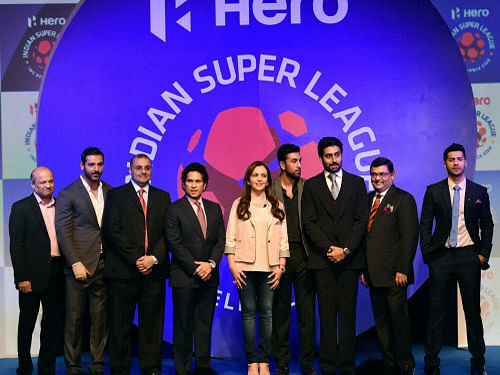 Team owners of the Indian Super League with AIFF President Praful Patel (second from right) in Mumbai on Thursday. Actors John Abraham, Abhishek Bachchan and Ranbir Kapoor, cricket legend Sachin Tendulkar and Nita Ambani, chairperson of IMG-Reliance, are also seen. PTI