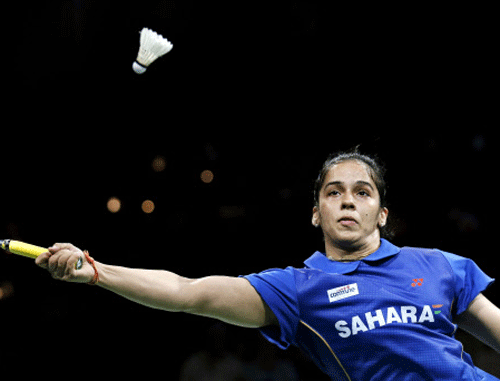 India's Saina Nehwal returns a shot to China's top seeded Li Xuerui, not seen, during their Quarter Final match at the World Badminton Championships at Ballerup Arena, Denmark, Friday, Aug. 29, 2014. AP photo