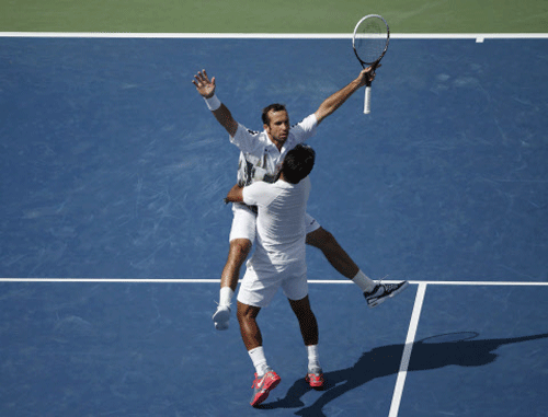 Defending champions Leander Paes and Radek Stepanek progressed to the men's doubles third round of the US Open at Flushing Meadows here. Reuters file photo