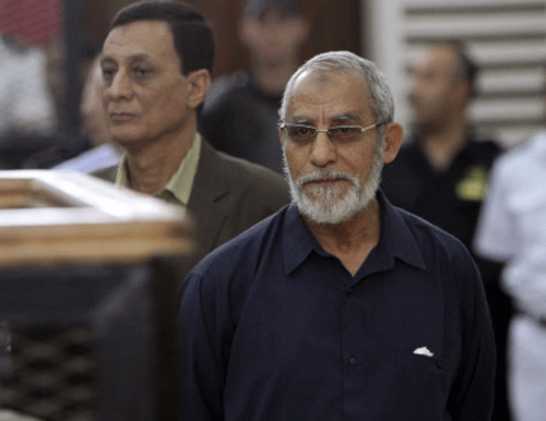 Mohammed Badie, 71, was charged with killing at least nine people and inciting violence that injured 21 others in clashes near a mosque in Giza in July 23, 2013. Reuters photo