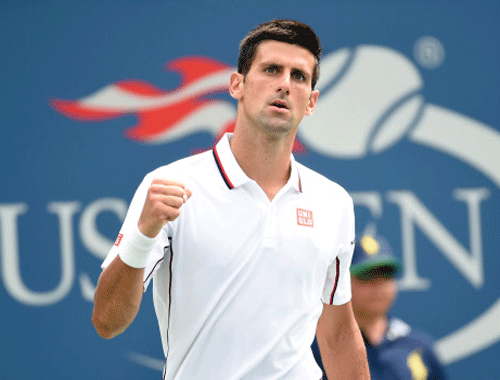 Novak Djokovic (SRB) reacts after defeating Sam Querrey (USA) on day six of the 2014 U.S. Open tennis tournament at USTA Billie Jean King National Tennis Center. Reuters photo