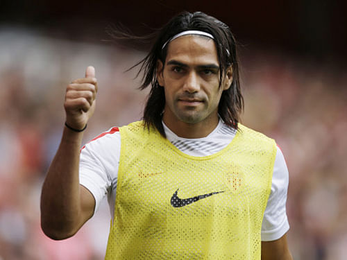 Manchester United swooped from nowhere on Monday to make striker Radamel Falcao the surprise big signing on the last day of Europe's record-breaking summer transfer window. AP file photo