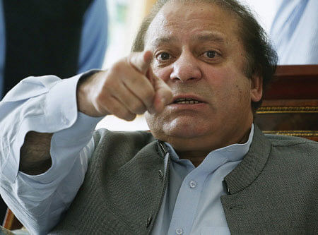 Embattled Pakistan Prime Minister Nawaz Sharif today said he will neither resign nor go on leave, even as anti-government protesters led by Imran Khan and Tahirul Qadri continue to mount pressure on him to step down. Reuters photo