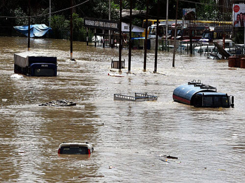 Submerged vehicles at Jahangir Chowk following heavy rains and floods in Srinagar. Seventy boats and five teams of the National Disaster Response Force (NDRF) have been sent to Jammu and Kashmir for the rescue and relief of flood-affected people. PTI photo