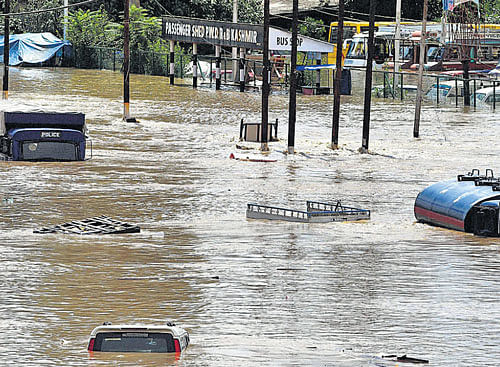 Vehicles are submerged at Jahangir Chowk following heavy rain and flooding in Srinagar. Reuters