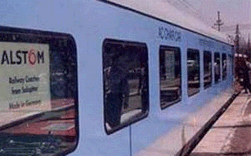 A 50-year-old woman had a miraculous escape today as she emerged unhurt after a Rajdhani express train passed over her when she tripped and fell on railway track at Khurja railway station. PTI file photo for representational purpose only
