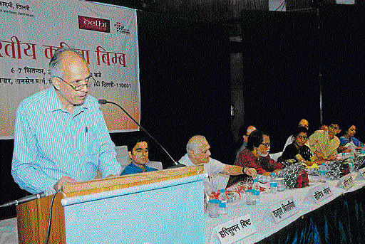 Harisuman Bisht, secretary of Hindi Academy addresses poets at 'Bharatiya Kavita Bimb'.