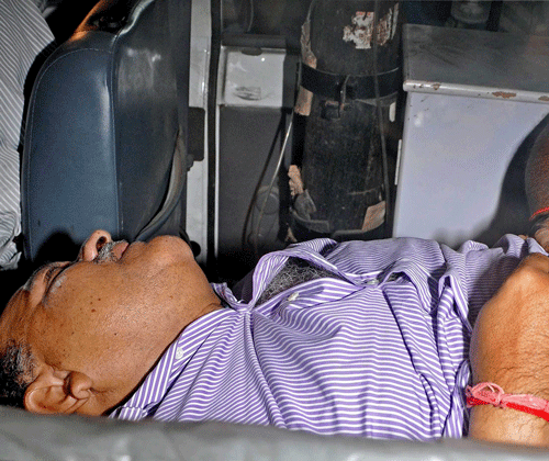 Former Director General of West Bengal Police Rajat Majumdar on the way to a hospital after he was arrested by the CBI in connection with the multi-crore Saradha chit fund scam in Kolkata on Tuesday. PTI Photo