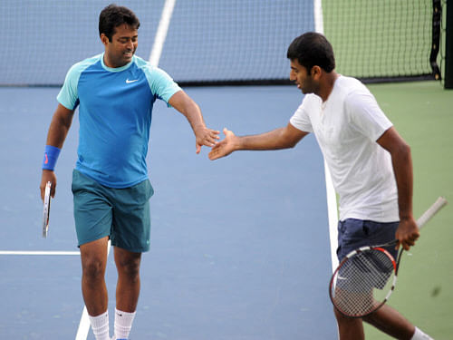 Leander Paes and Rohan Bopanna during their team practice session at KSLTA Stadium in Bangalore. DH photo