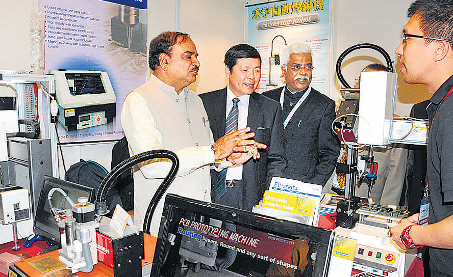 Union Minister for Chemicals and Fertilizers Ananth Kumar, Taipei Economic and Cultural Centre in India Ambassador Chung Kwang Tien, LUB National President H V S Krishna at the inauguration of EMMA EXPO 2014, organised by IMS in Bangalore on Thursday. DH Photo/B H Shivakumar