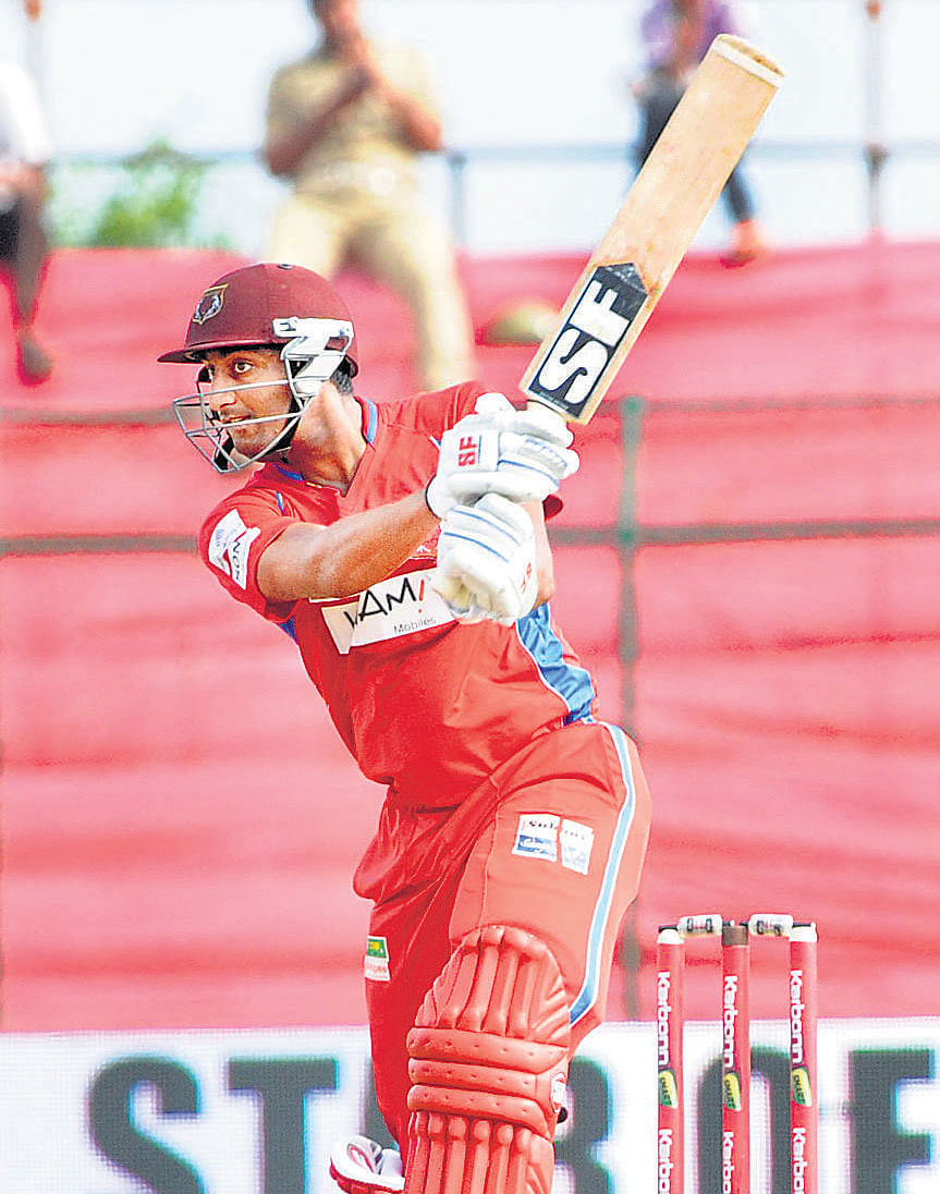 Belagavi Panthers' Suneel Raju drives one to the fence en route his unbeaten 57 against Bijapur Bulls in the KPL semifinal on Thursday. DH PHOTO/ M R MANJUNATH