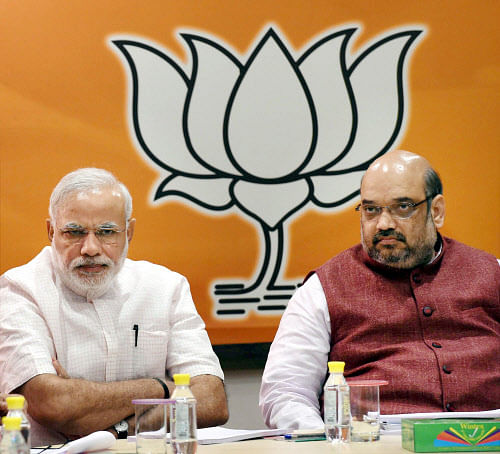 Prime Minister Narendra Modi with BJP President Amit Shah during the party's parliamentary board meeting in New Delhi. PTI File Photo