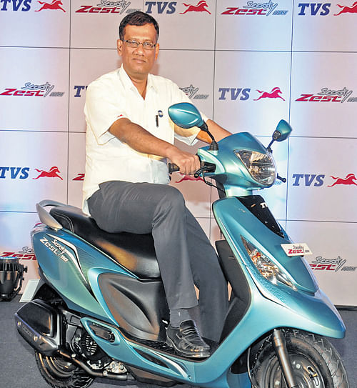 TVS Motor Company VP J S Srinivasan with the TVS Scooty Zest 110 cc at the launch in Bangalore. The scooter is priced at Rs 44,800 (ex-showroom Bangalore). DH Photo by S K Dinesh